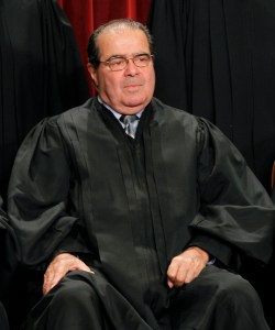 Associate Justice Antonin Scalia during the group portrait of the U.S. Supreme Court at the Supreme Court Building in Washington, Friday, Oct. 8, 2010. (AP Photo/Pablo Martinez Monsivais)